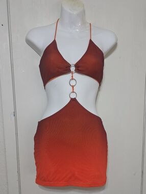 Orange Dress. Size XS. 95% Polyester, 5% Spandex. Made In China.